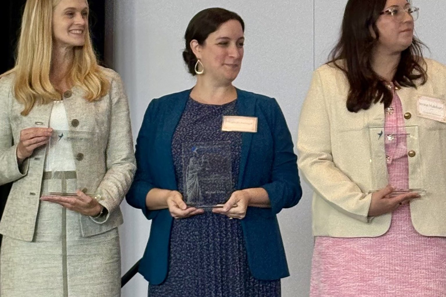 Amber Russell receiving the TCWLA award